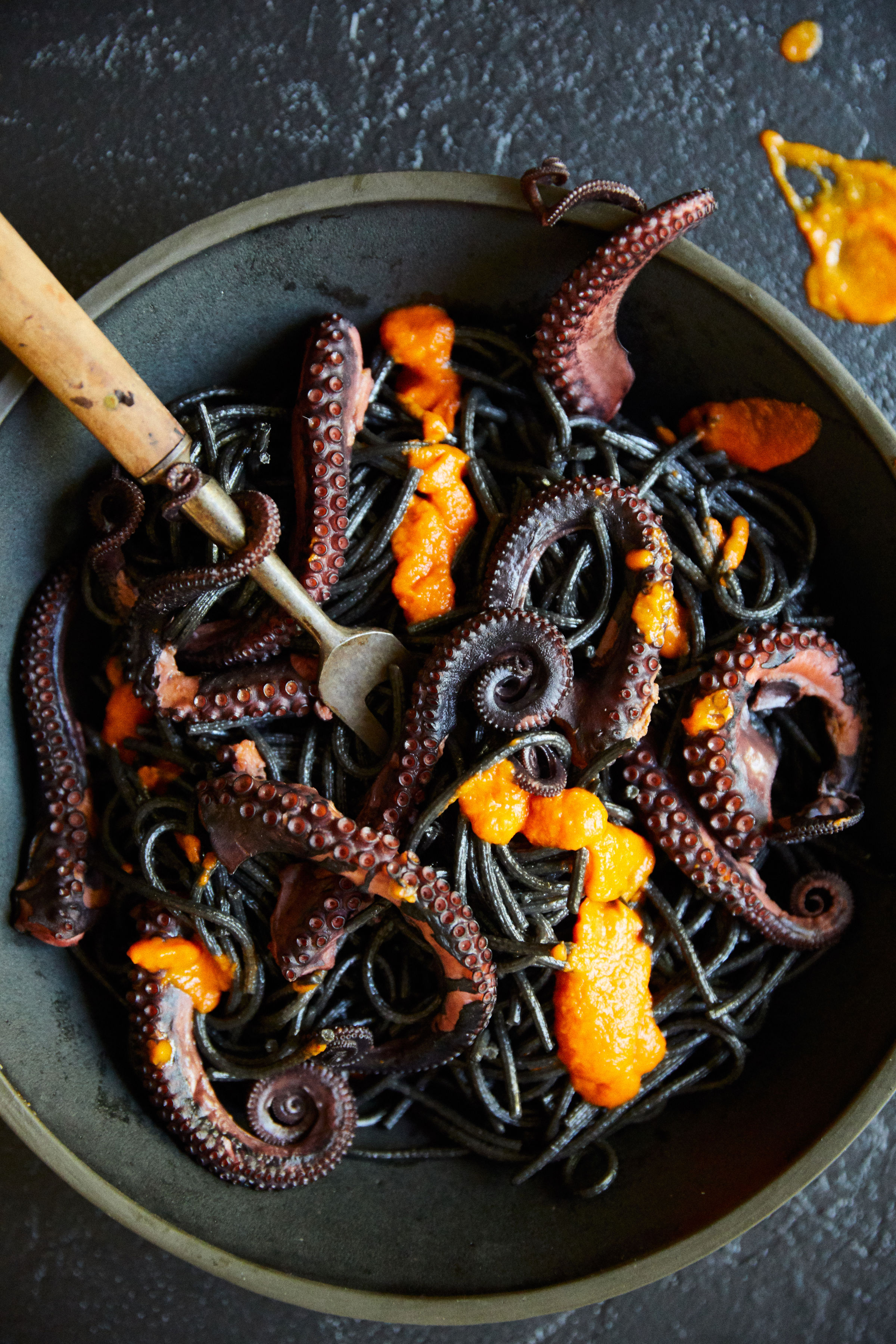 Squid Ink Pasta With Octopus And Spicy Tomato Sauce